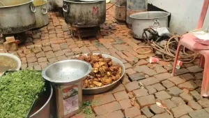 A feast organised by the Congress party to welcome its Uttar Pradesh chief Ajay Rai in the temple town