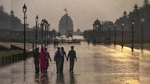 Knee-deep water, slow-moving traffic and rain-soaked roads marked Tuesday in Delhi as the national
