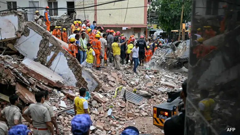 Five Officials Suspended After Collapse The building, which housed a boys' PG near Delhi