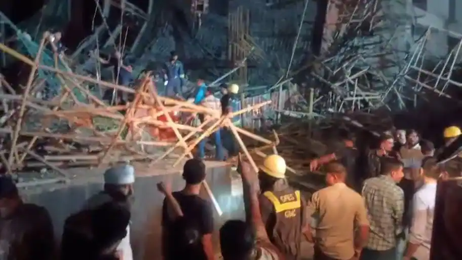 Two died and eight suffered injuries after a large crane came down at a building site