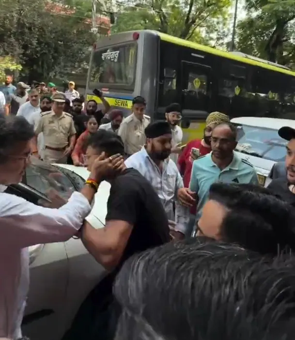 with smiles and a customary handshake between the Minister and the AAP MLA — Things began