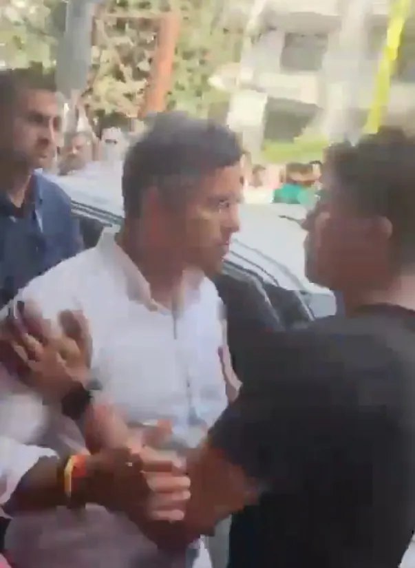 with smiles and a customary handshake between the Minister and the AAP MLA — Things began
