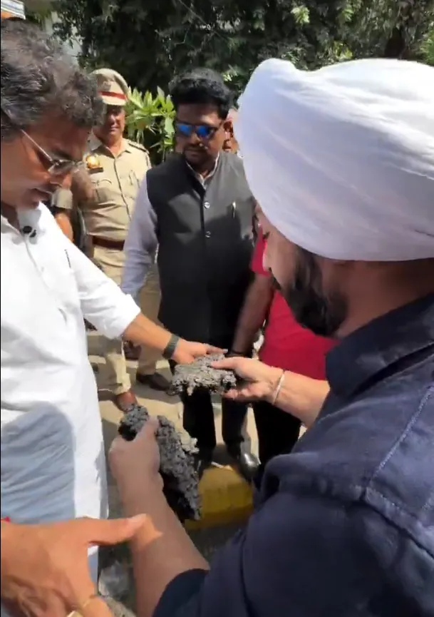 with smiles and a customary handshake between the Minister and the AAP MLA — Things began