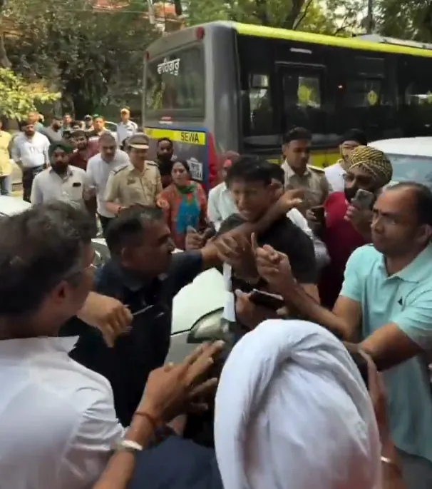 with smiles and a customary handshake between the Minister and the AAP MLA — Things began