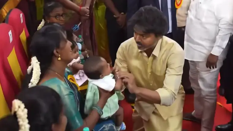 Rolling out the scheme at the Government Rajaji hospital, Vijay held the babies for a while