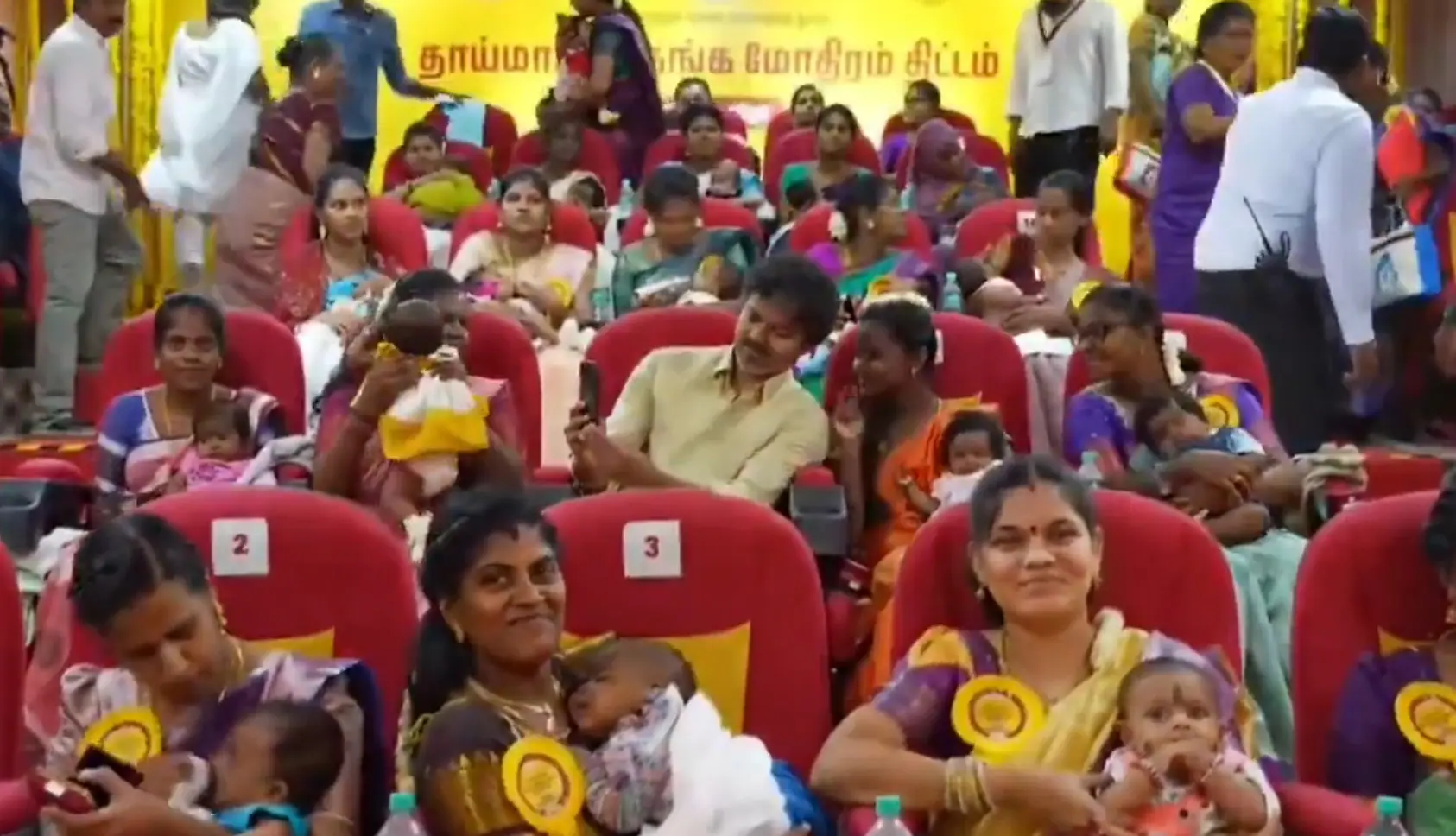 Rolling out the scheme at the Government Rajaji hospital, Vijay held the babies for a while