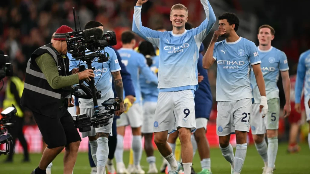 Manchester City shrugged off the threat of swingeing sanctions to beat 10-man Liverpool 3-0
