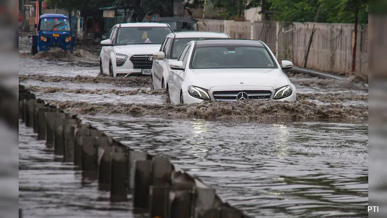 Heavy rain in the early hours of Monday caused widespread waterlogging in Gurugram